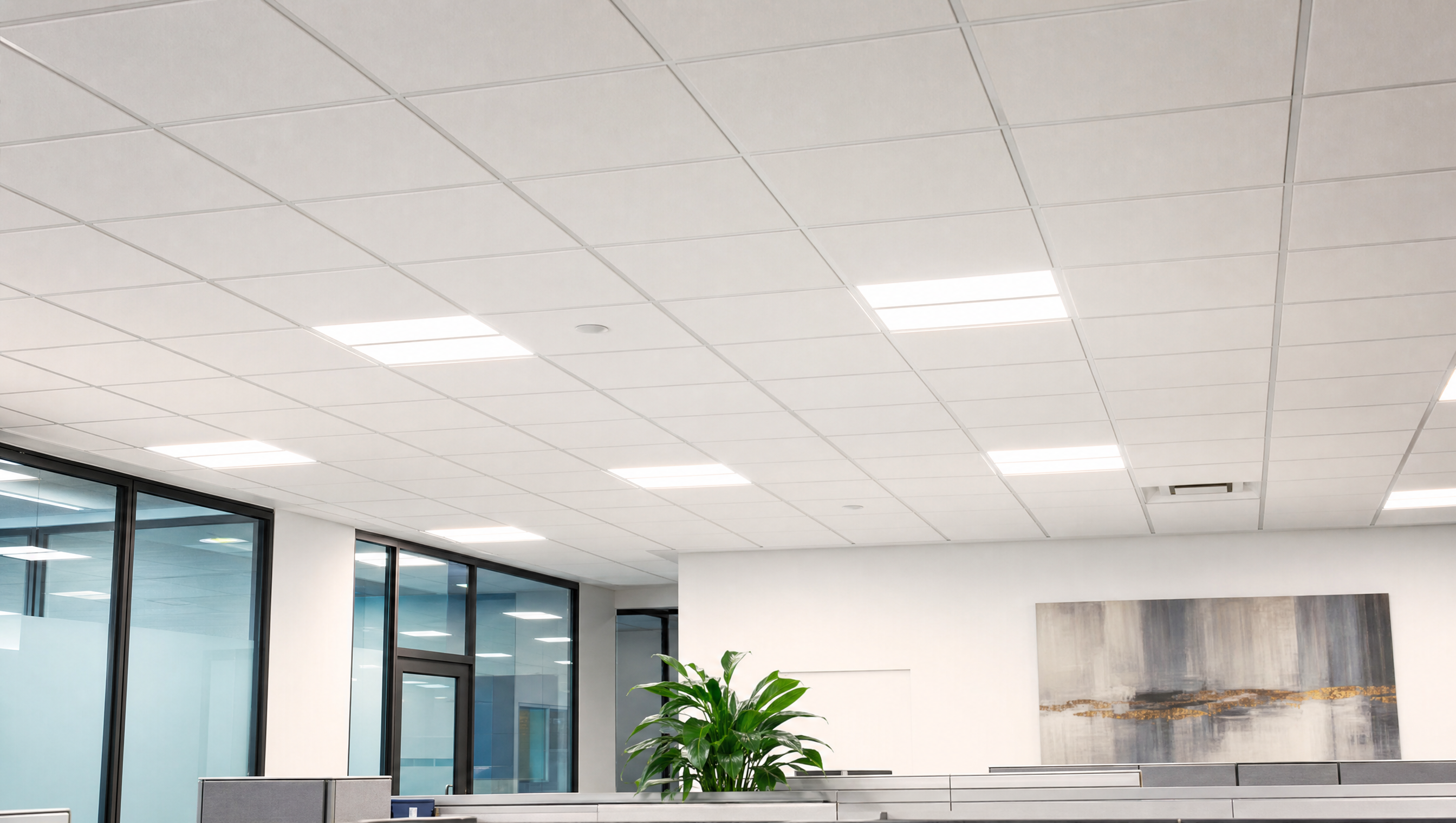 Finished T-bar suspended ceiling grid in a bright commercial office
